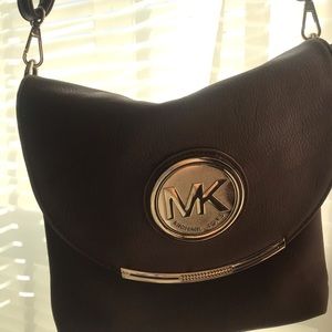 Micheal Kors crossbody purse.